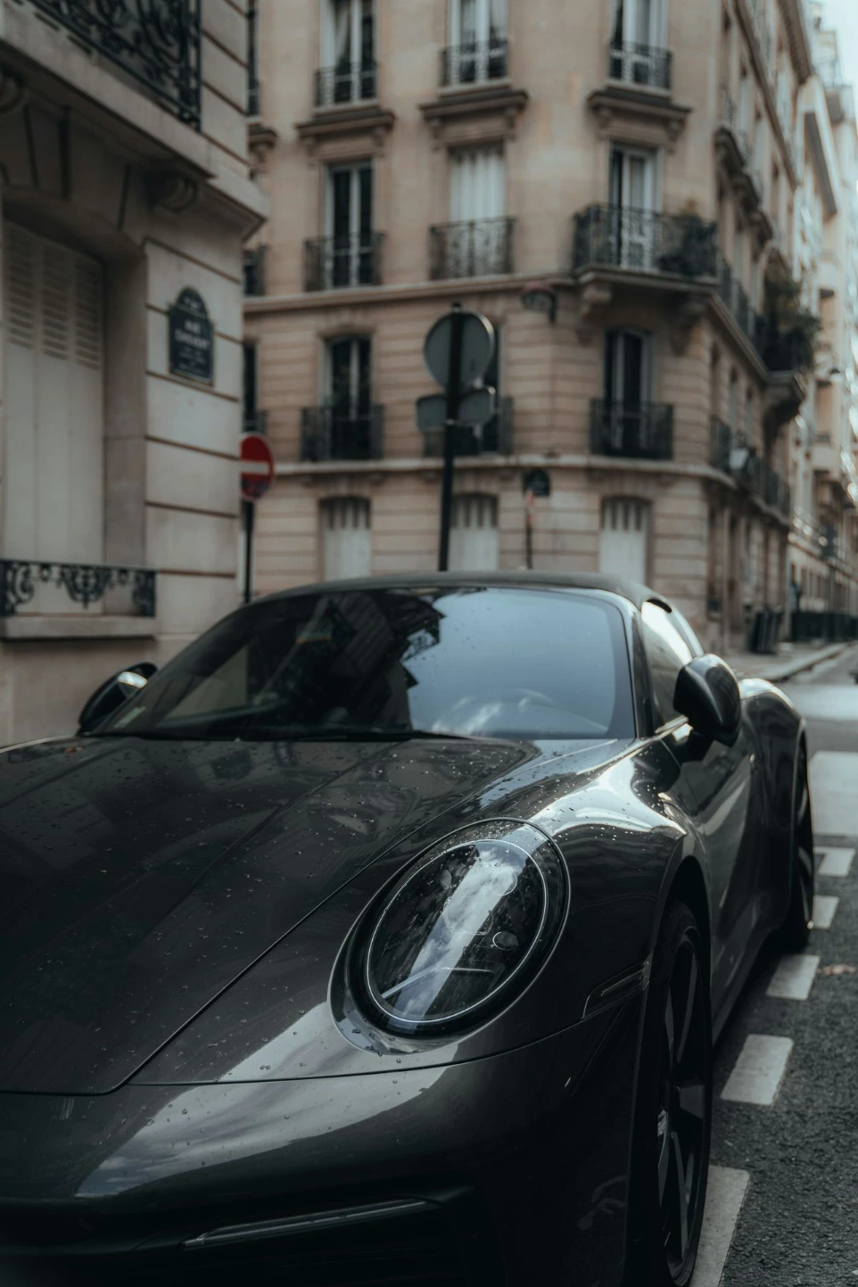 a black sports car parked on the side of the road